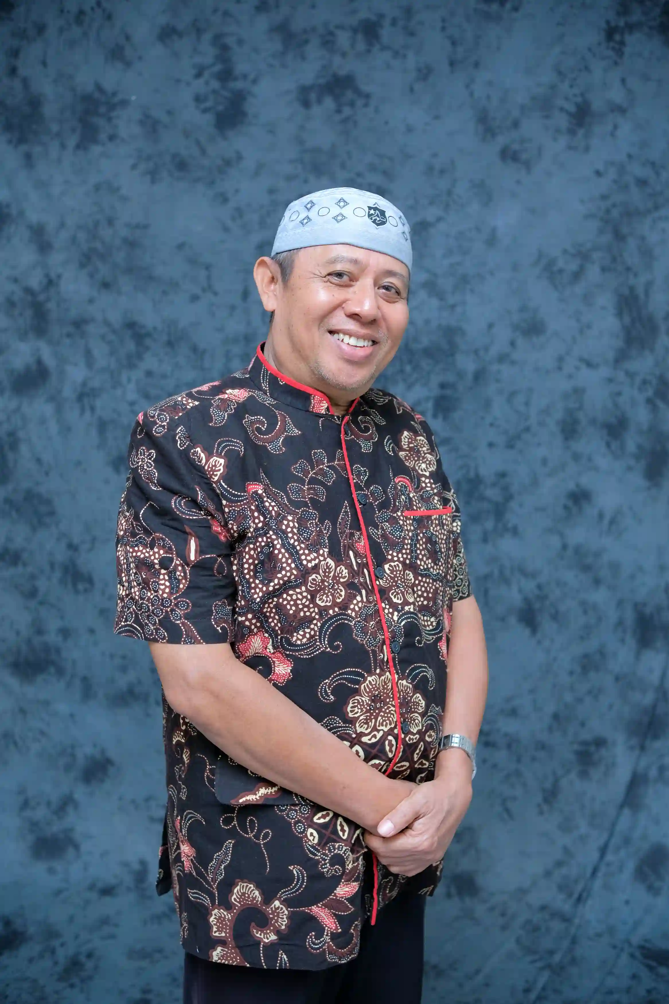 Dr. Juliater Simarmata